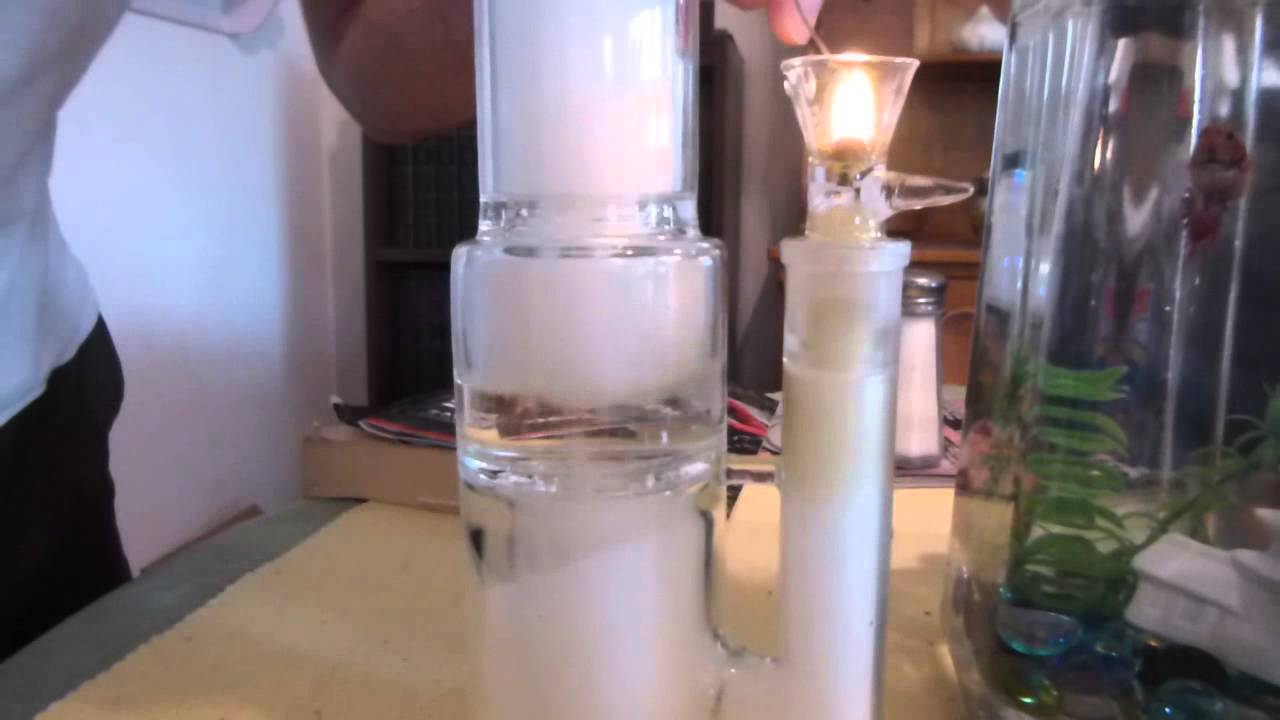 Taking a rip of some of OG in my favorite bong.... PERCULES