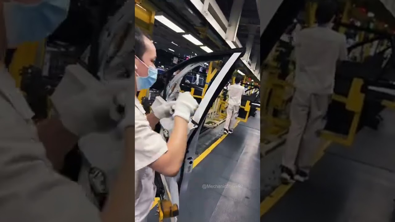 Volkswagen car production door assembly process.