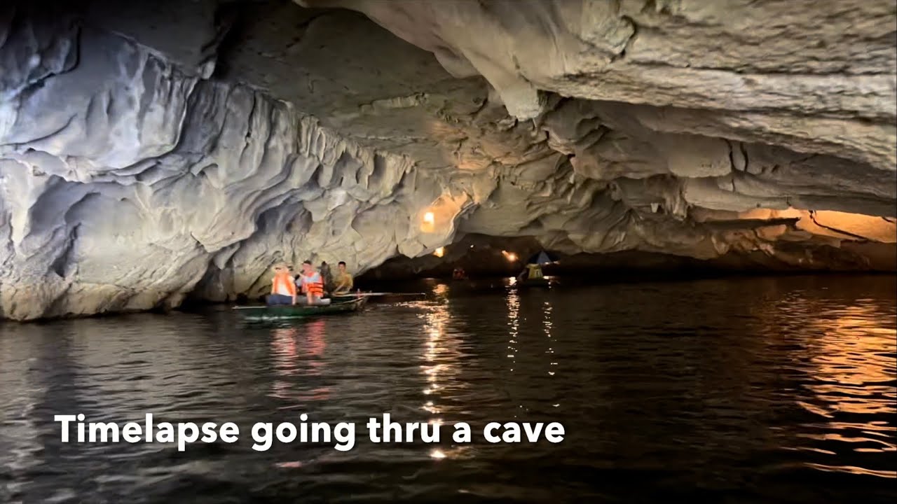 Tam Coc relaxing boat tour past karst mountains, rice fields, thru 3 caves in Ninh Binh Vietnam