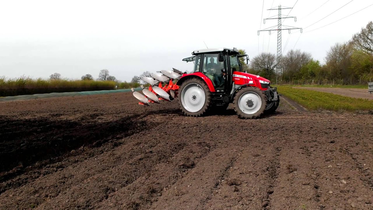 MF 5600 (5609) mit Kuhn 3 Schar Pflug