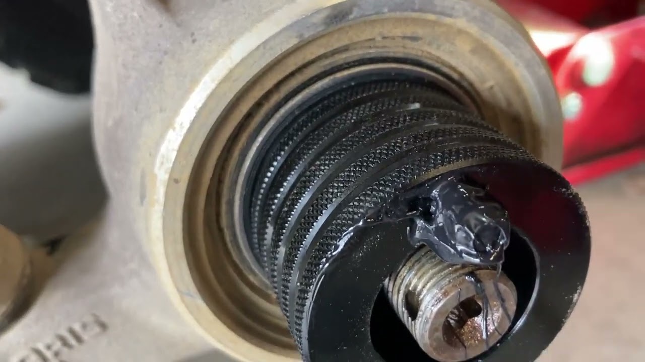 How to remove hub to grease bearings Polaris Sportsman
