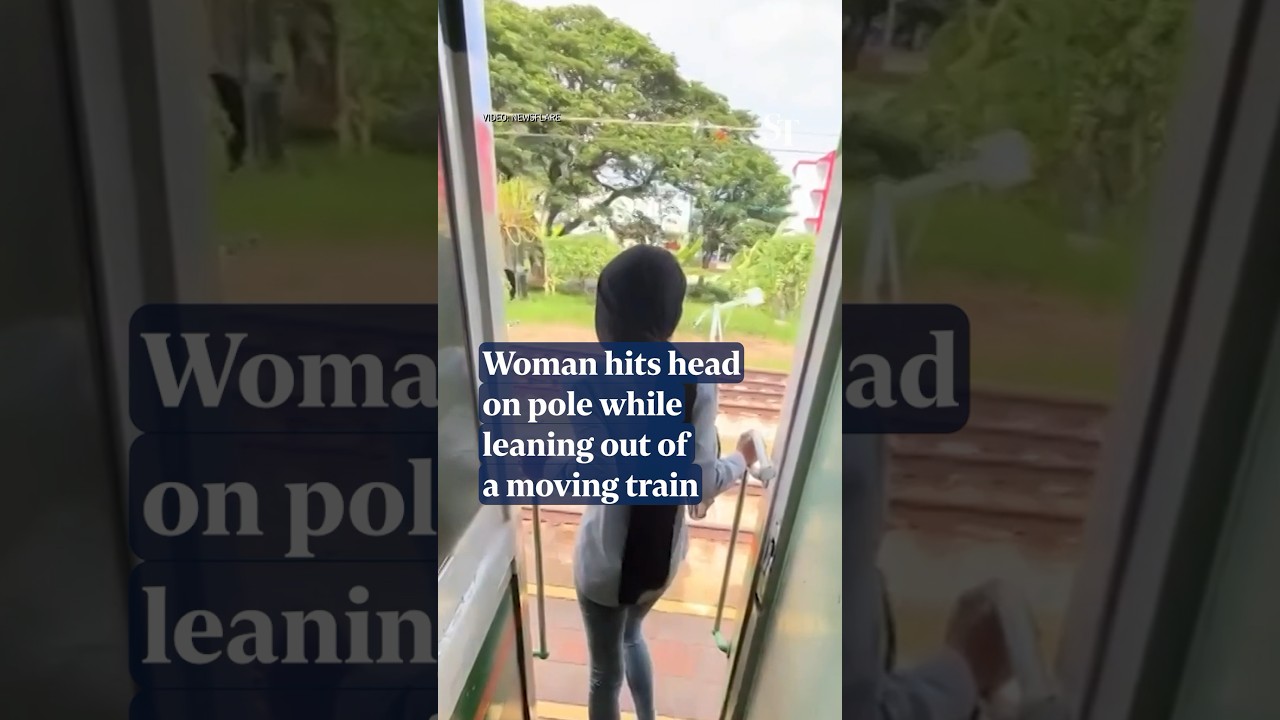 Woman hits head on metal post while hanging out from moving train