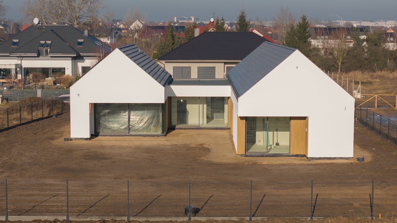 Okna aluminiowe w podw&oacute;jnej stodole z projektu Nano Studio