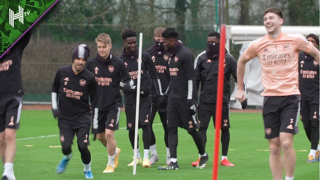 'Cold? Wet? Winter training? Fresh t-shirt, please' I Kieran Tierney all smiles in Arsenal training