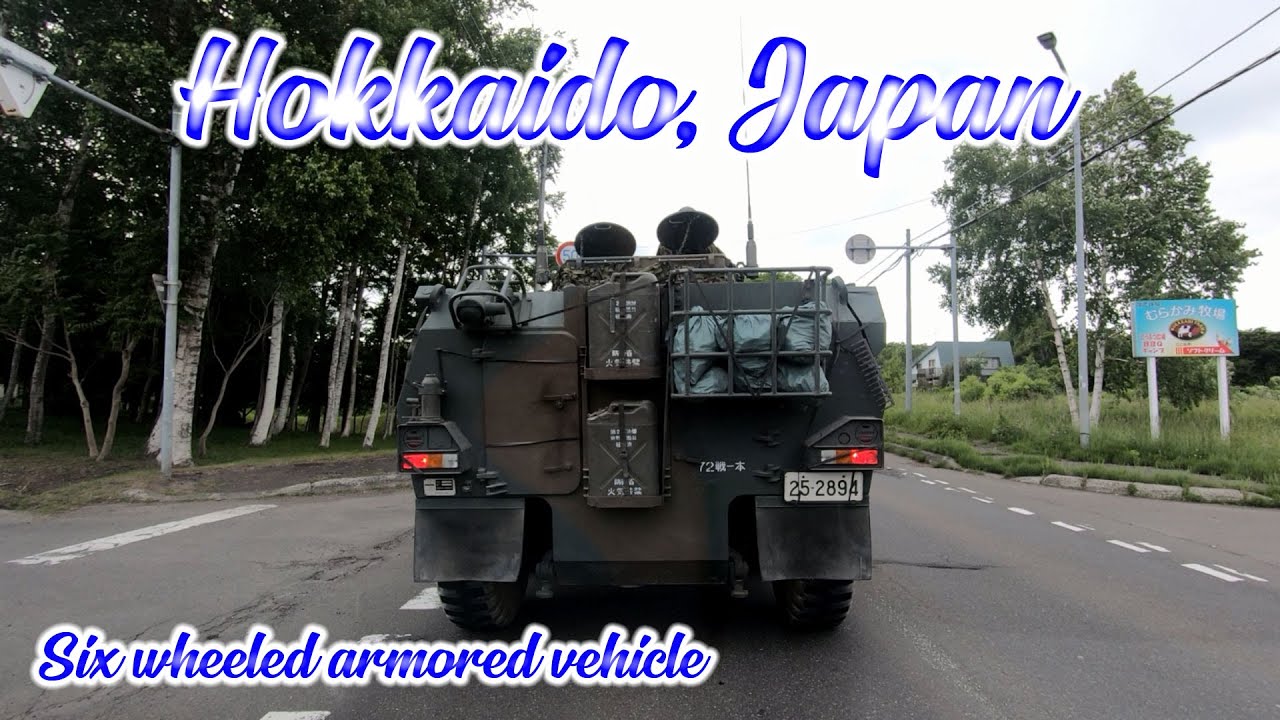 Six wheeled armored vehicle on the road in Hokkaido, Japan. ORANGE ua