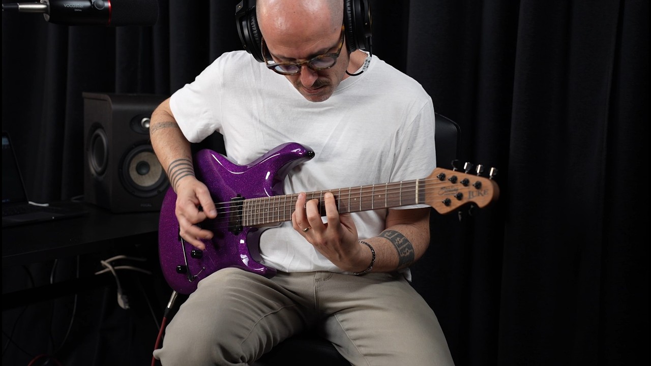 Sterling by Music Man | Luke 100 Purple Sparkle