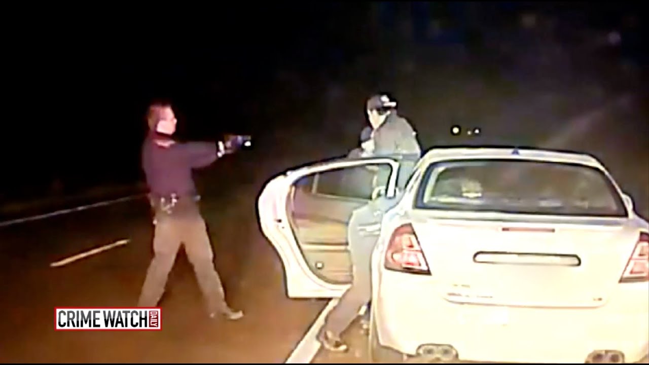 CrimeTube: Traffic Stop Takes Dangerous Turn When Passenger Makes Gun Grab - Crime Watch Daily