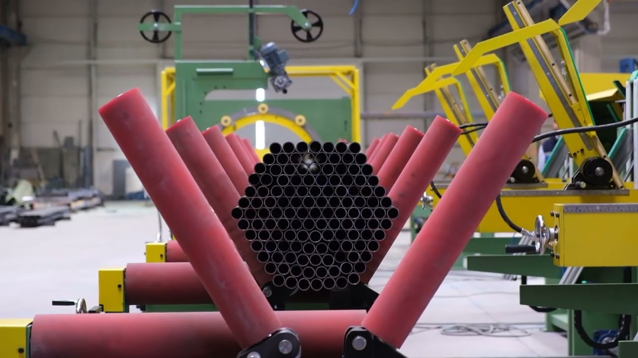 AUTOMATIC TUBE PACKAGING AND JUTE WRAPPING MACHINE