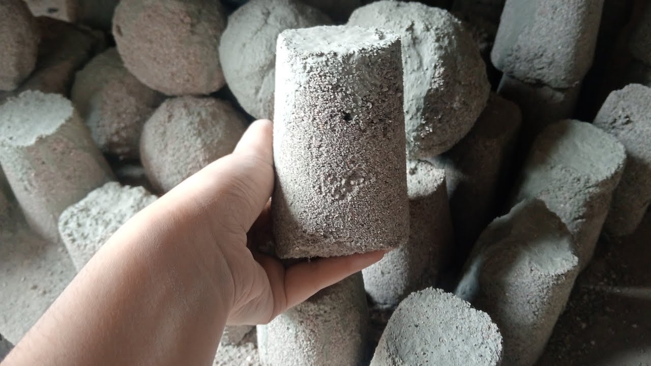 Brand new video of brand new texture grainy sand cement crumbling dry in clay pot and in water 