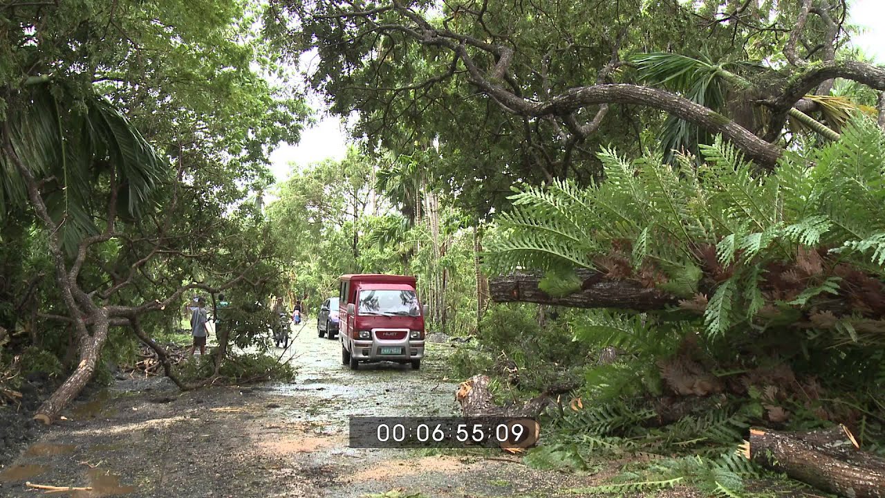 Typhoon Nari / Santi Crashes Into Luzon, Philippines Stock Footage Screener HD 1920x1080 30p