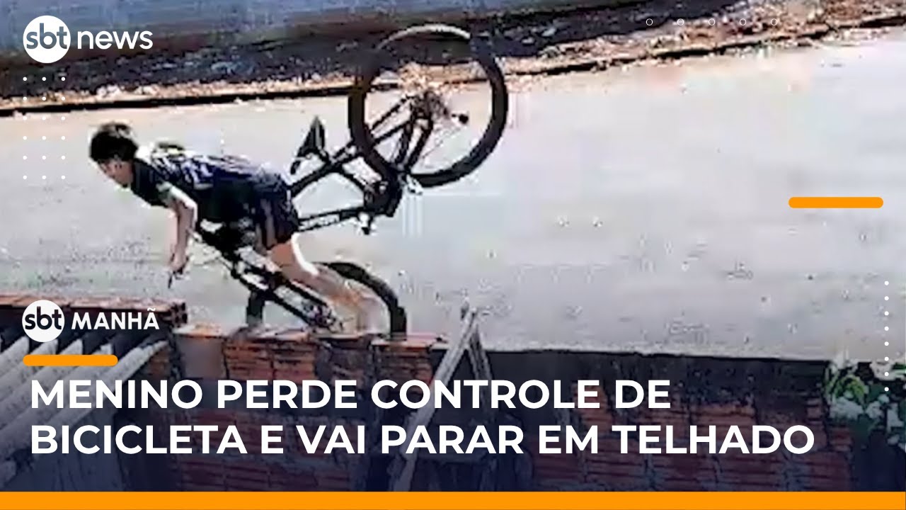 Menino de 11 anos perde controle de bicicleta e sobe em telhado | #SBTManhã