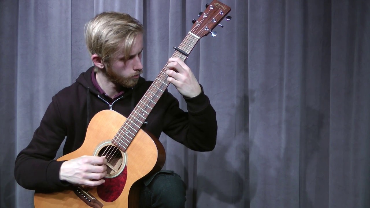 Adam Bjoraker plays “The Water Is Wide,” traditional, arr. Ed Gerhard