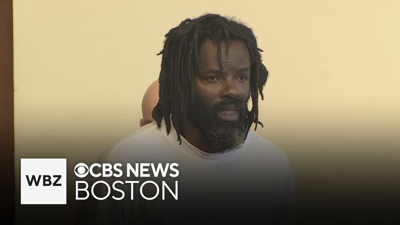 Man accused of shooting himself with police officer's gun interrupts prosecutor during arraignment