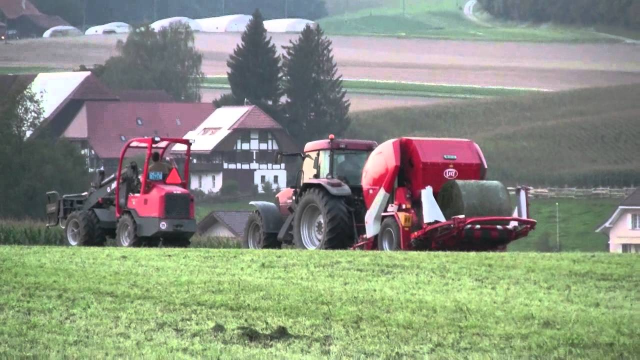 Case MX 170 mit Welger RPC 245 Tornado und Giant Lader