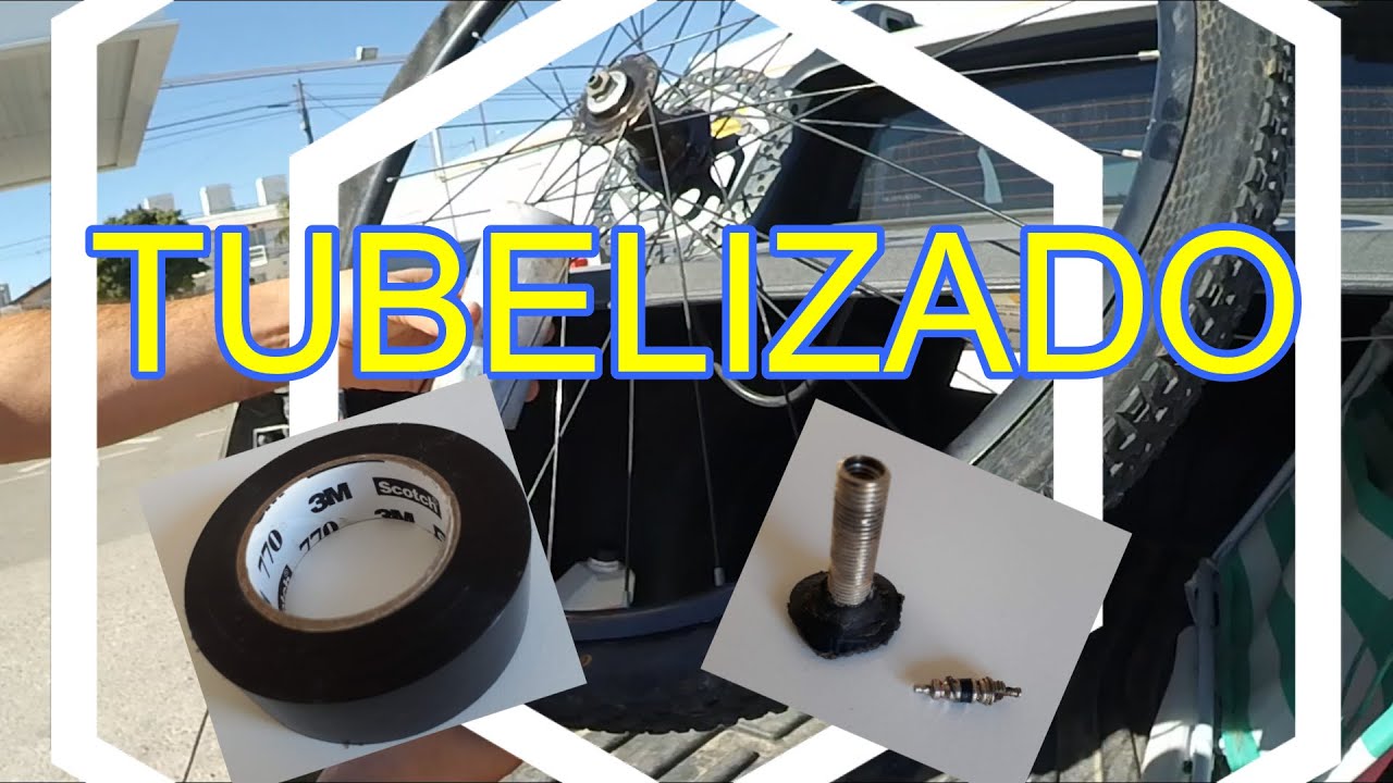 Tubelizar rueda mtb con cinta para cables aislante y pico de auto super fácil!!