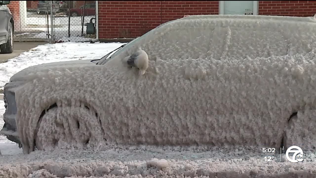 Water main break leaves cars covered in ice on Dearborn Heights street