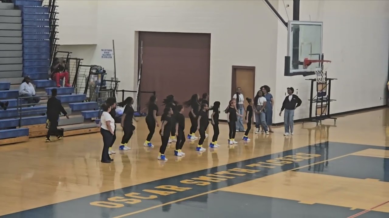 Cheer performance at OS. Carver VS Thurgood. 25-0