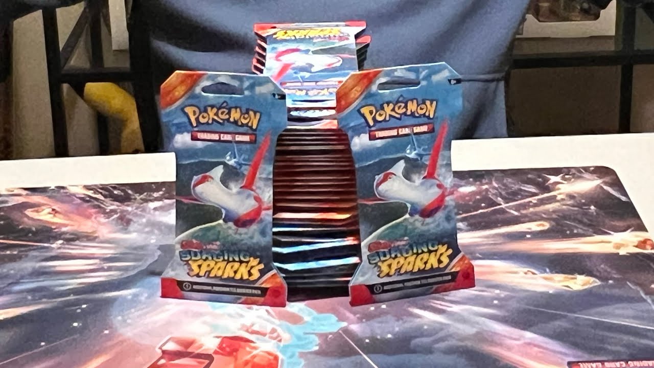 Can we PULL the CHASE?! Opening 27 packs of Surging Sparks chasing the $600 PIKACHU!