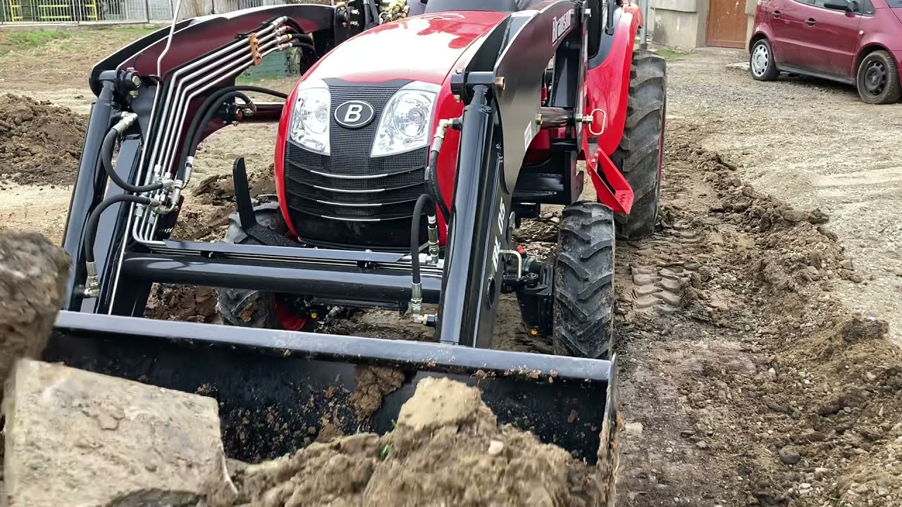 Branson 2500h tractor digging into the hard soil!