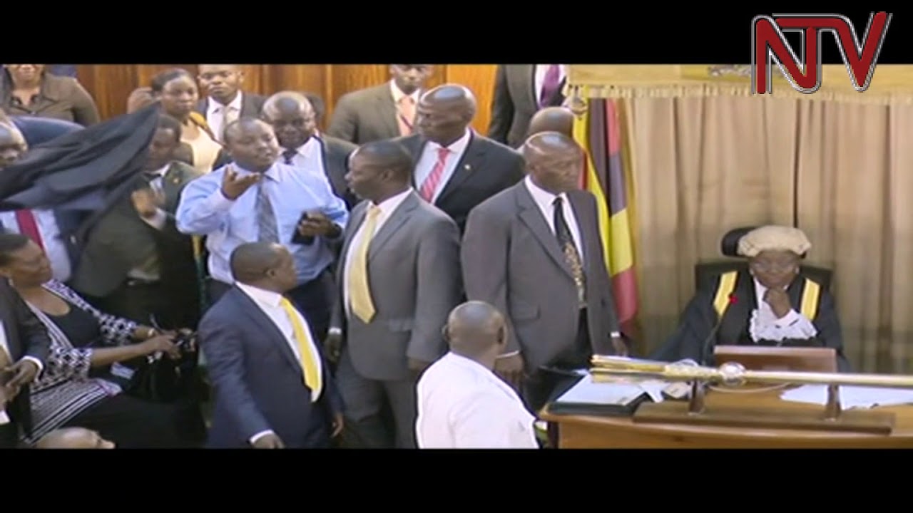 Brawl in Parliament as Opposition MPs accuse Hon. Ronald Kibuule of bringing a Gun into the House
