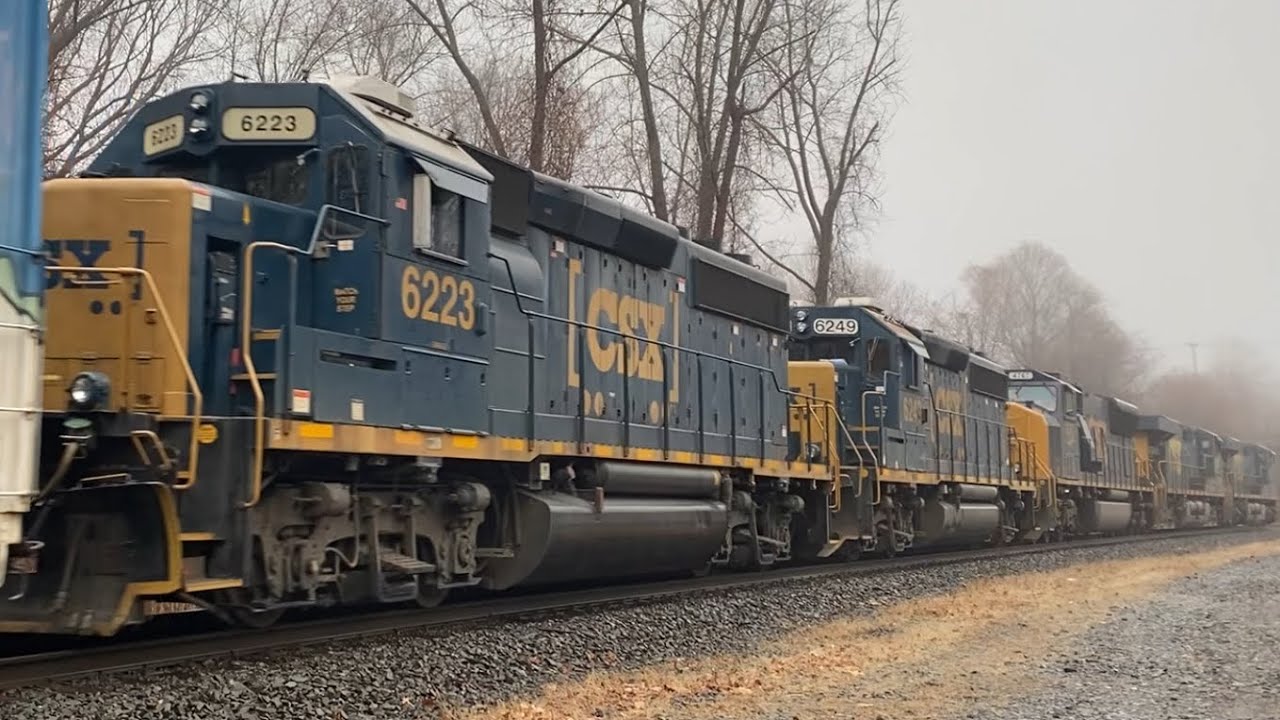 Good sized 107 car CSX M436 passes CP57 behind I022 with 3 EMDs