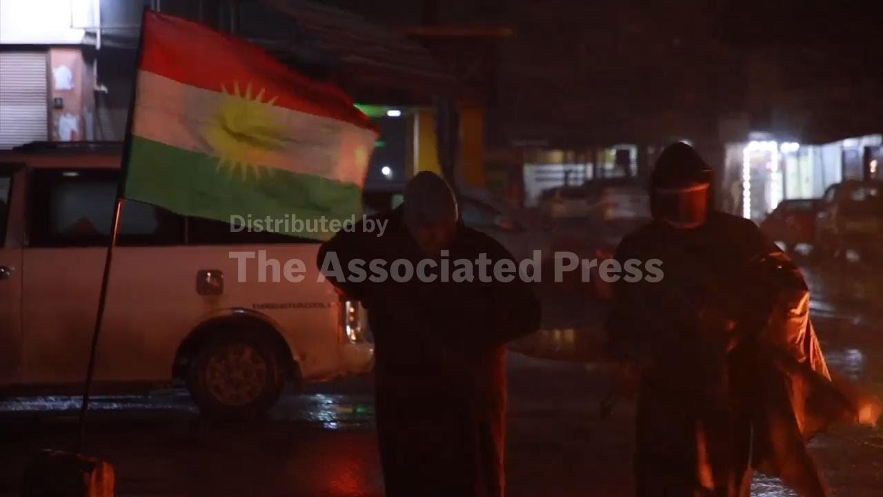 Syrian Kurds volunteer to carry guns and protect their cities at night