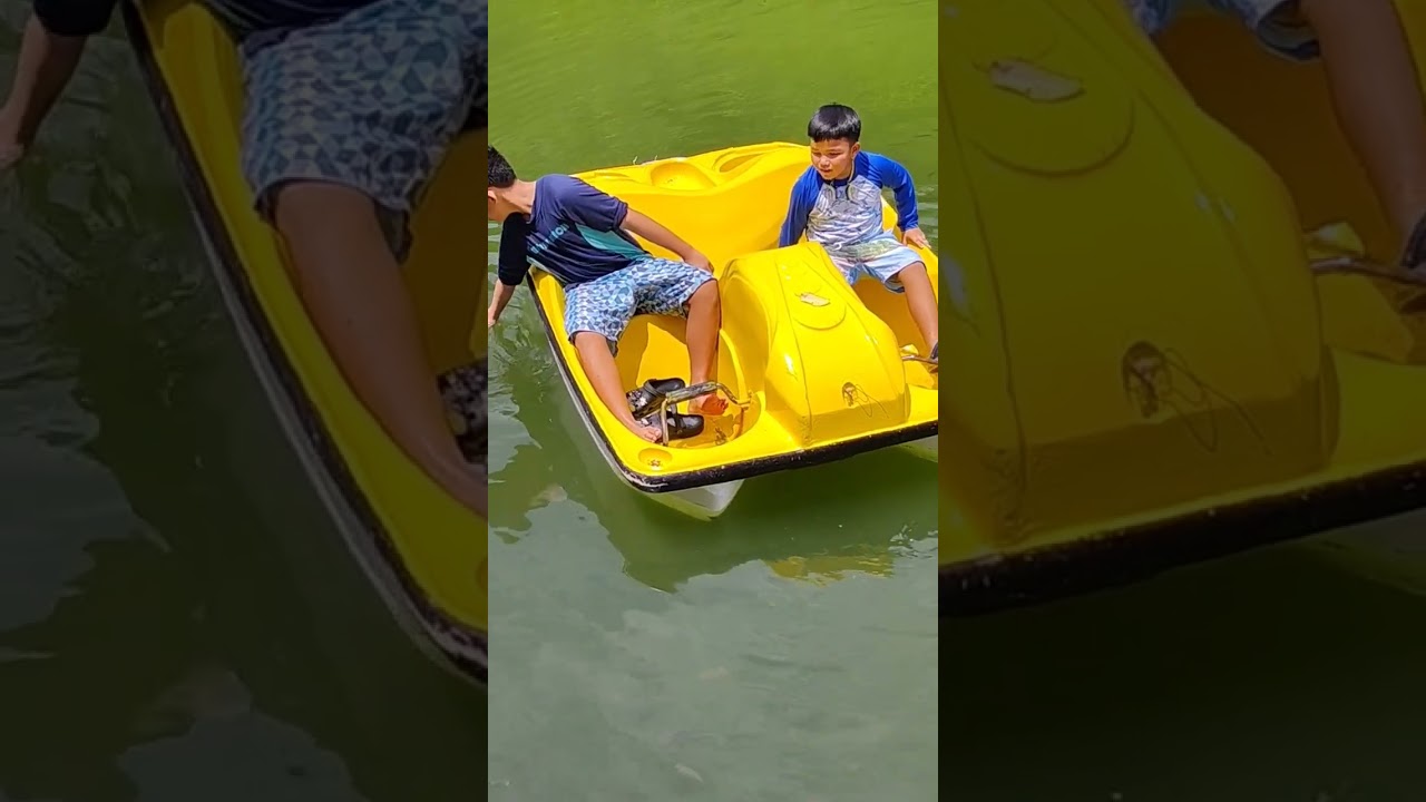 Pedal boat ride surrounded by lots of fishes
