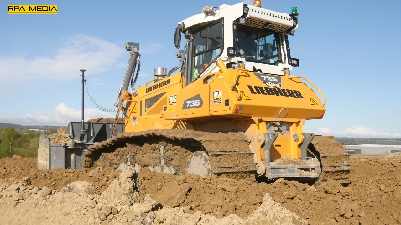 LIEBHERR 736 dozer spreading material out on a new distribution warehouse development