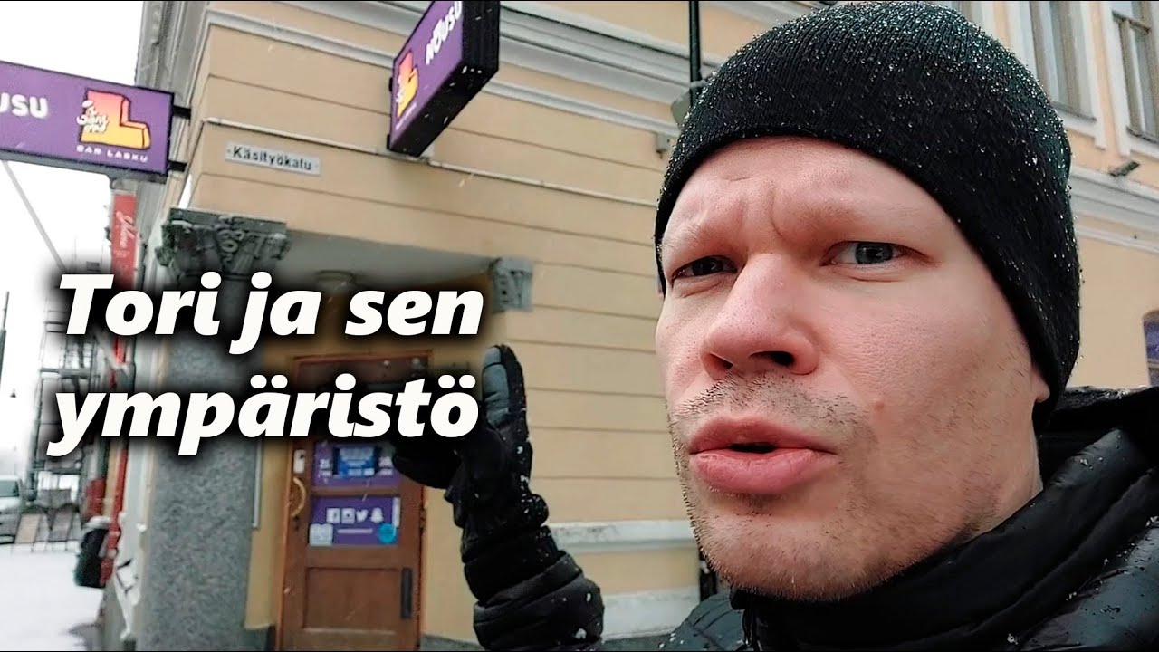Seikkailu Kuopion keskustassa lumisadepäivänä