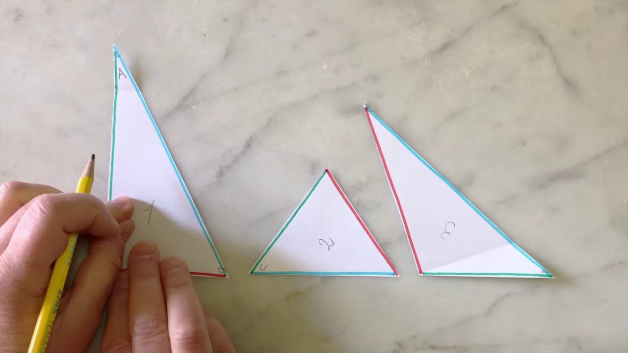 Le altezze dei triangoli. Geometria con la carta