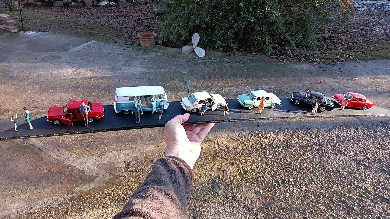 Slot Car pályához dekorációs kiegészítők autók, figurák képében. 