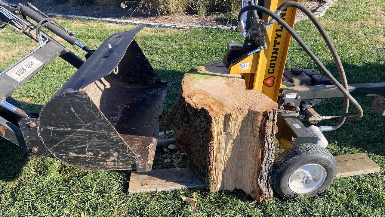 Splitting huge rounds/ firewood