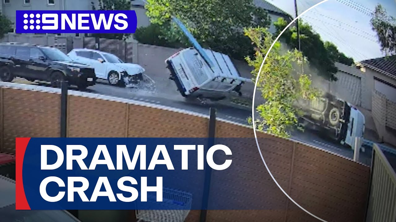 CCTV captures frightening crash on busy Adelaide road | 9 News Australia