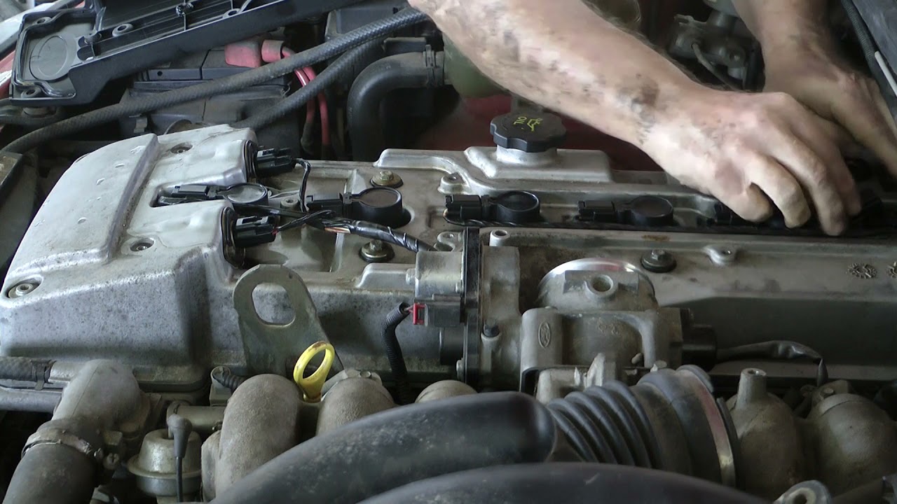 How to change Ignition coils on Ford Barra 6, BA, BF,  Ford Territory, clean oil in plug cavity.