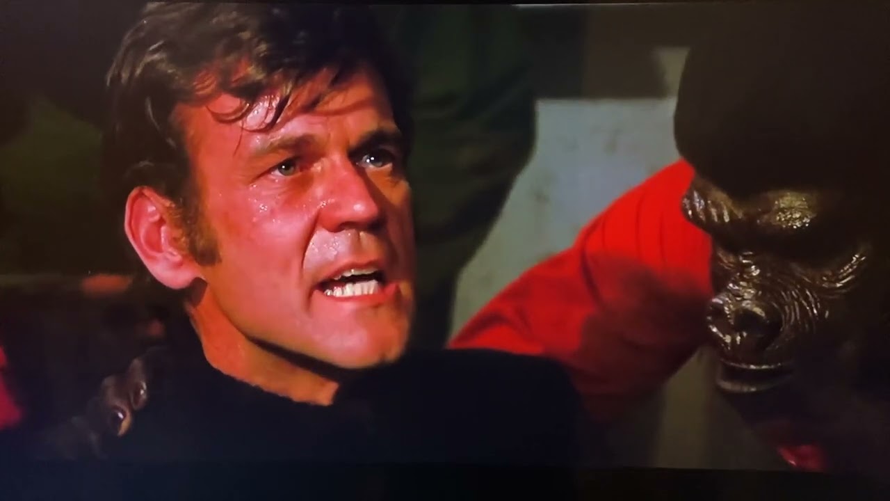 Evil human speaks to Caesar conquest of the planet of the apes 1972 ￼