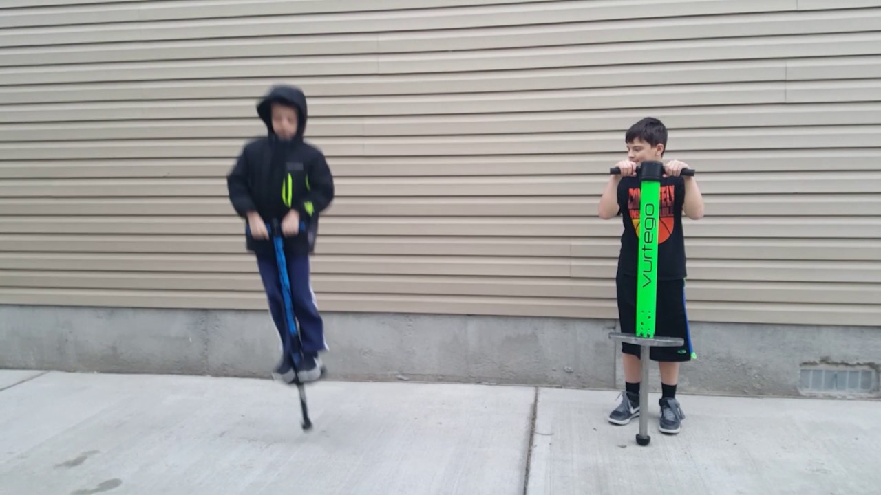 Teaching my little brother how to POGO STICK