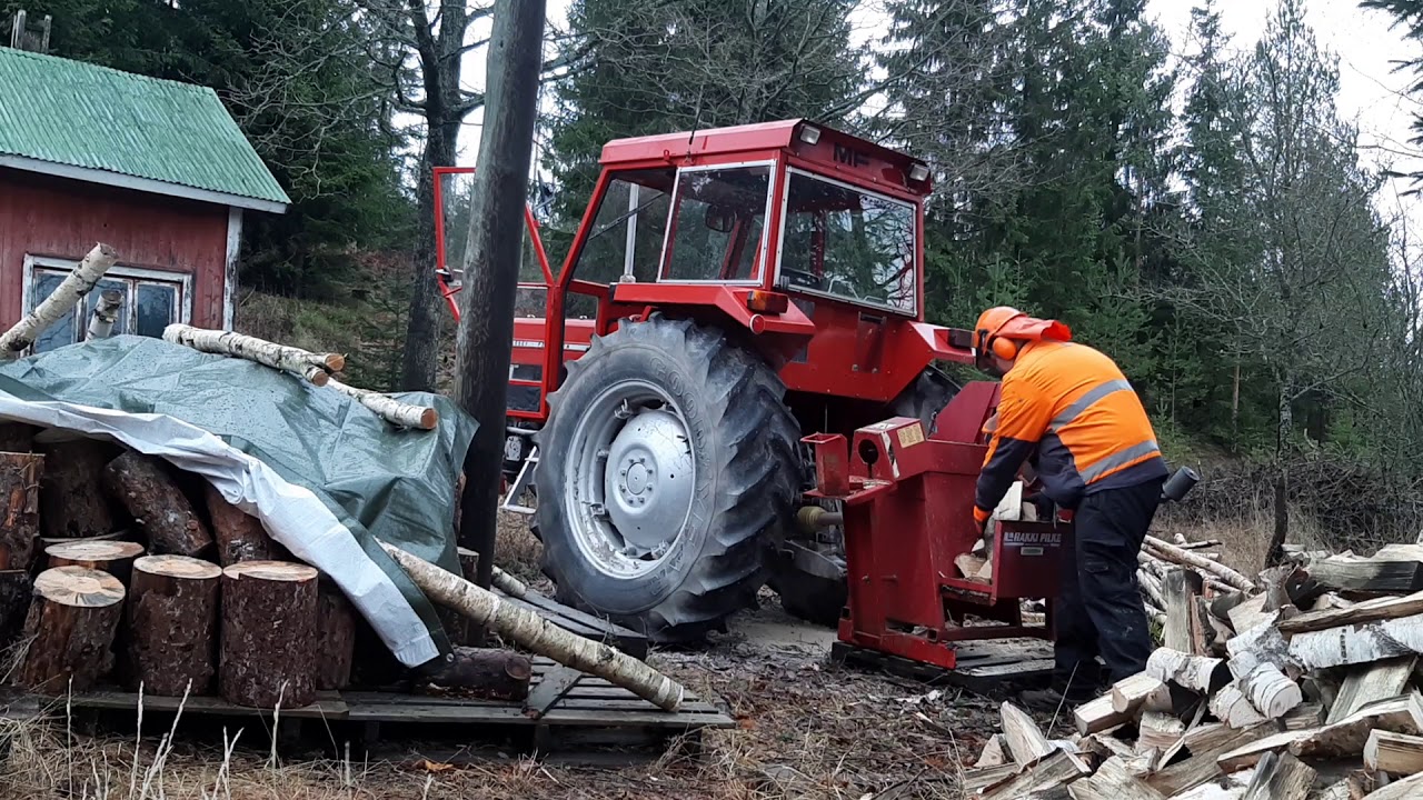 Polttopuun tekoa massey ferguson 185 ja hakki pilke. Klapisirkkeli.  firewood processing