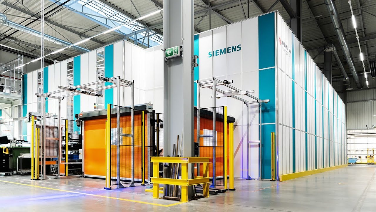 AutoStore mit vollautomatischem KLT-Wareneingang | Siemens Rastatt | Deutsch