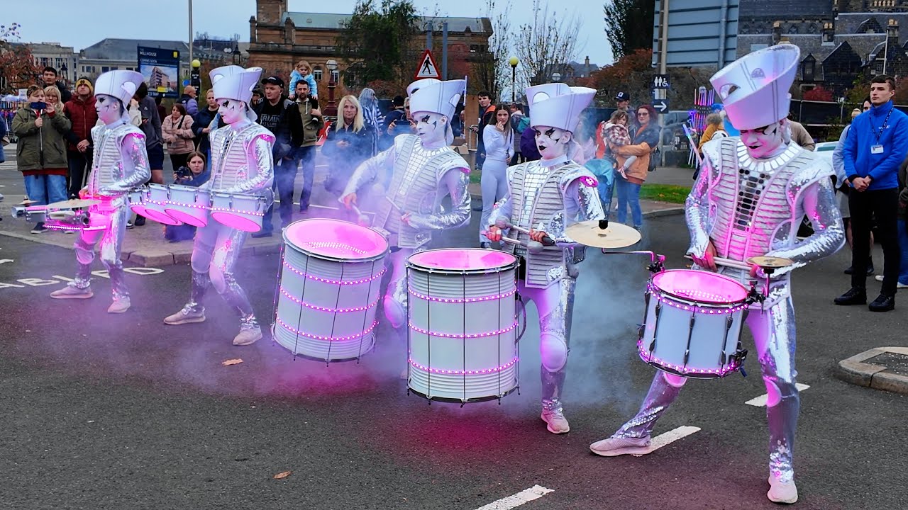 Spark! LED drummers street theatre drumming show at 2024 Paisley Halloween Festival in Scotland