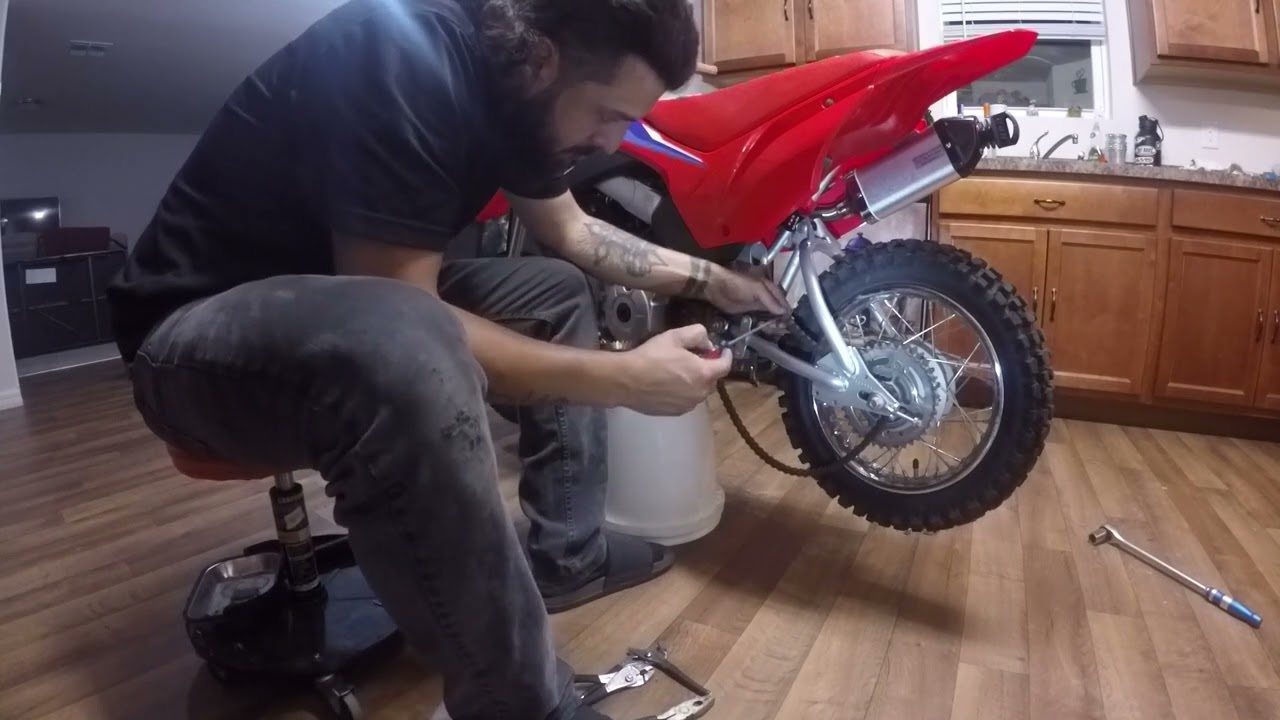 2022 CRF110 CHAIN GUIDE AND WHEEL SPACERS PART 1