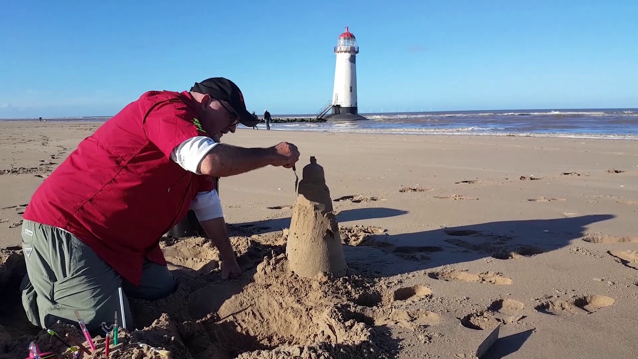 How to build a sandcastle - Build a sand lighthouse in Wales in the UK - Part 2