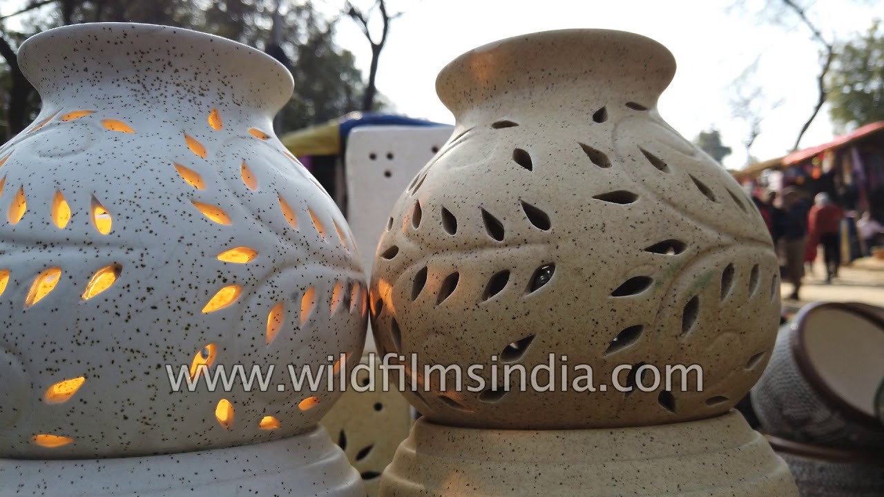 Clay pots, bronze artefacts and wooden products available at Surajkund Mela