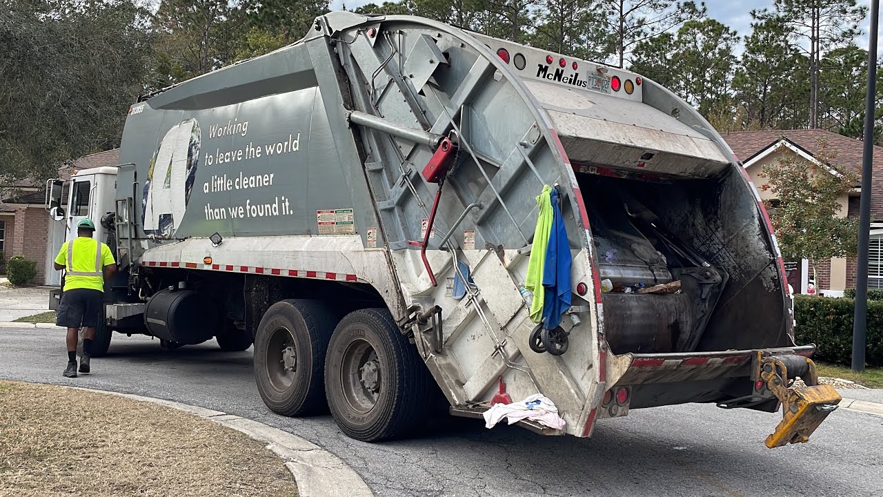 Advanced Disposal Mack MR 32yd McNeilus Rear Loader Garbage Truck