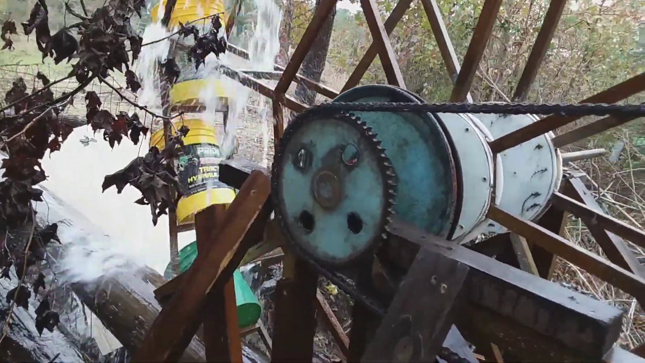 Making power! Homemade water wheel.