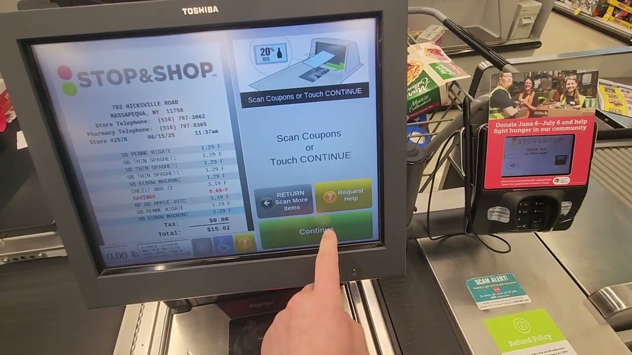 Paying with coins on a Toshiba Convertible Self Checkout at Stop & Shop in Massapequa, NY