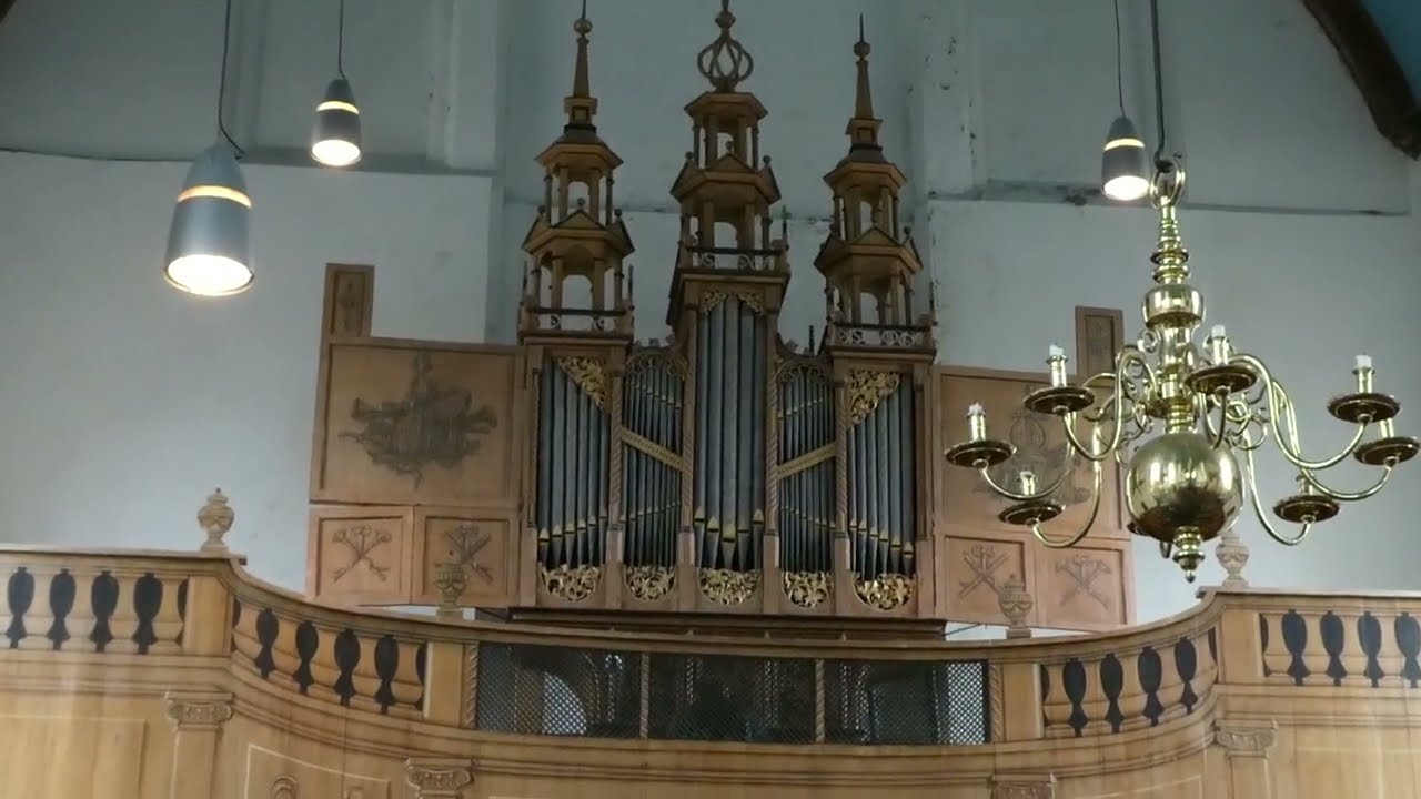 Sietze de Vries demonstrates the historic organ in the Grotekerk, Oosthuizen