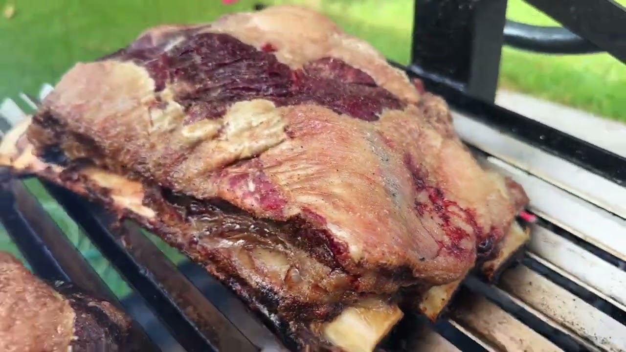Open fire beef ribs on Santa Maria grill