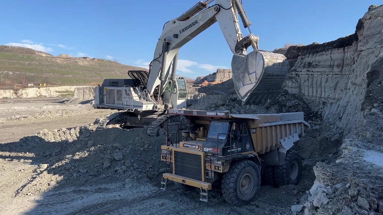 Liebherr 984 Excavator Loading Caterpillar 775E & 773D Dumpers - Labrianidis Mining Works