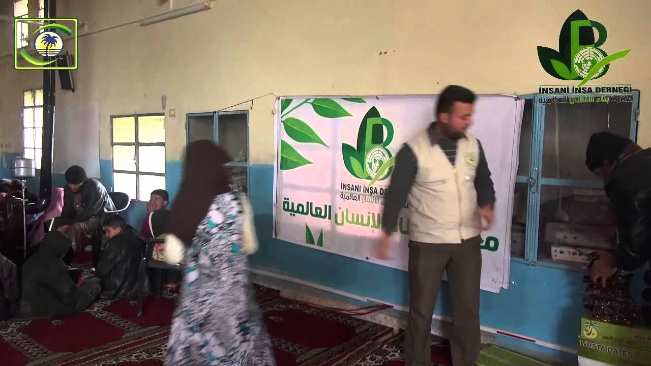 منادي الخير- بالتعاون مع منظمة بناء الإنسان العالمية-توزيع التمور في الشيخ ادريس-سوريا 11-2-2015