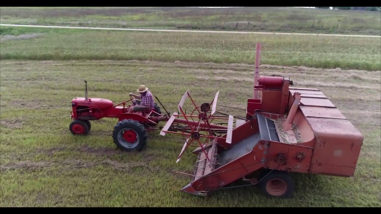 CA Powering a 60A All-Crop Harvester with Pickup Attachment combining organic oats!